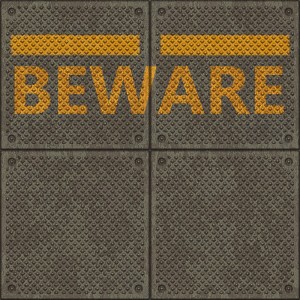 "Beware" Sign on Platform